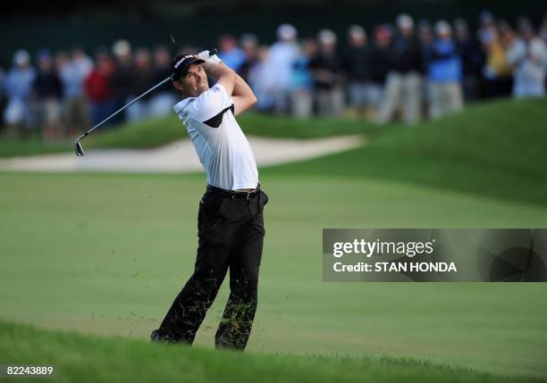 Padraig Harrington of Ireland hits from the 18th fairway during the final round of the 90th PGA Championship on August 10, 2008 at Oakland Hills...