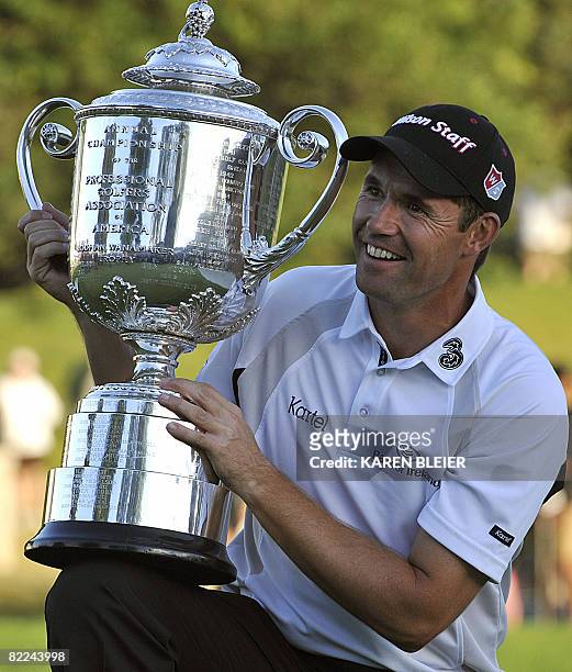 Padraig Harrington of Ireland poses with the Wanamaker Trophy after winning the 90th PGA Championship August 10, 2008 at the Oakland Hills Country...