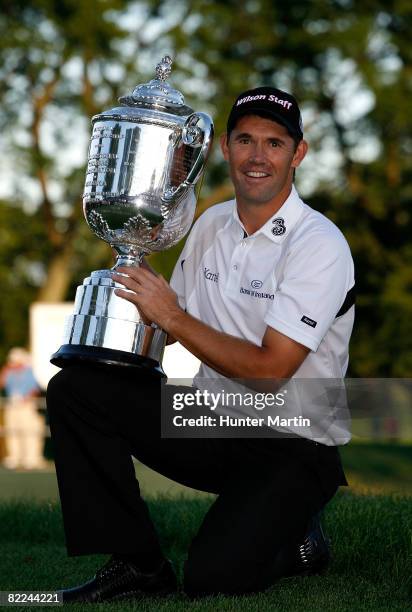 Padraig Harrington of Ireland celebrates with the PGA Championship Trophy after winning the 90th PGA Championship at Oakland Hills Country Club on...