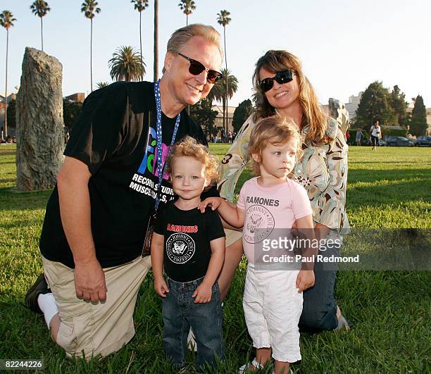 Guitarist Billy Zoom of X poses with his family at the Tribute To Legendary Ramones Guitarist Johnny Ramone at the Hollywood Forever Cemetery on...