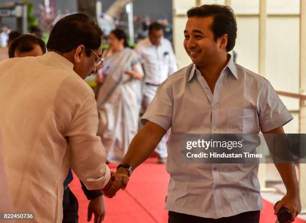 Congress MLA Nitesh Rane and BJP MLA Raj Purohit gesture at Vidhan Bhavan on Day 2 of the Monsoon Assembly Session, on July 25, 2017 in Mumbai, India.