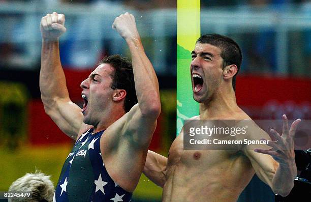 Garrett Weber-Gale and Michael Phelps of the United States celebrate finishing the Men's 4 x 100m Freestyle Relay Final in first place to win the...