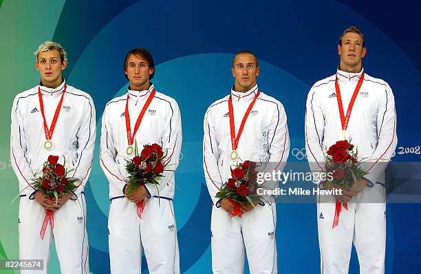 Amaury Leveaux, Fabien Gilot, Frederick Bousquet and Alain Bernard of France pose with the silver medal during the medal ceremony for the Men's 4 x...