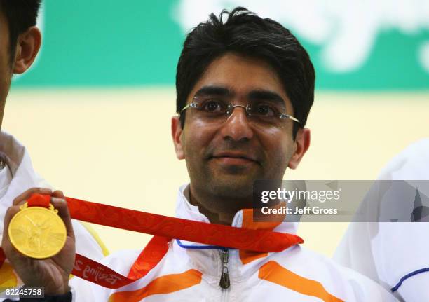 Abhinav Bindra of India poses with his gold medal in the Men's 10m Air Rifle Final at the Beijing Shooting Range Hall on day 3 of the Beijing 2008...