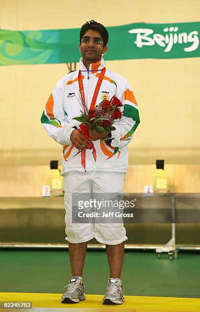 Abhinav Bindra of India poses with his gold medal in the Men's 10m Air Rifle Final at the Beijing Shooting Range Hall on day 3 of the Beijing 2008...