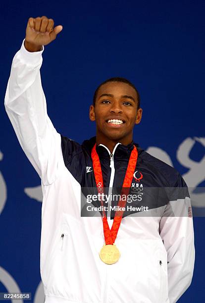 Cullen Jones of the United States poses with the gold medal during the medal ceremony for the Men's 4 x 100m Freestyle Relay held at the National...