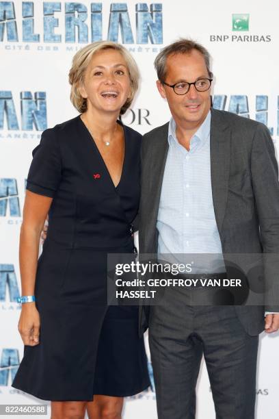 French right-wing Les Republicains party member and president of the Ile-de-France regional council Valerie Pecresse and her husband Jerome pose for...