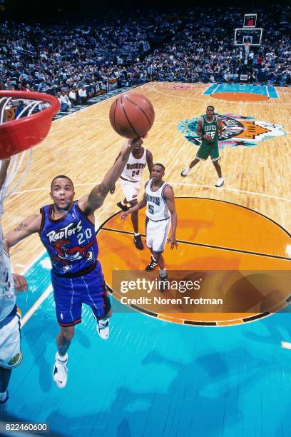 Damon Stoudamire of the Toronto Raptors shoots during the 1996 Rookie Challenge played February 10, 1996 at the Alamodome in San Antonio, Texas. NOTE...