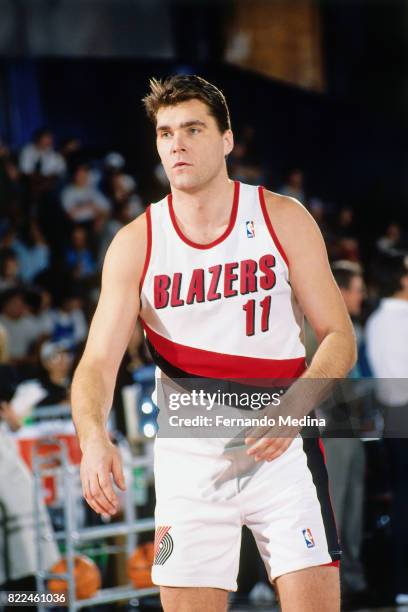 Arvydas Sabonis of the Portland Trail Blazers looks onto the court during the 1996 Rookie Challenge Practice on February 9, 1996 at the Alamodome in...