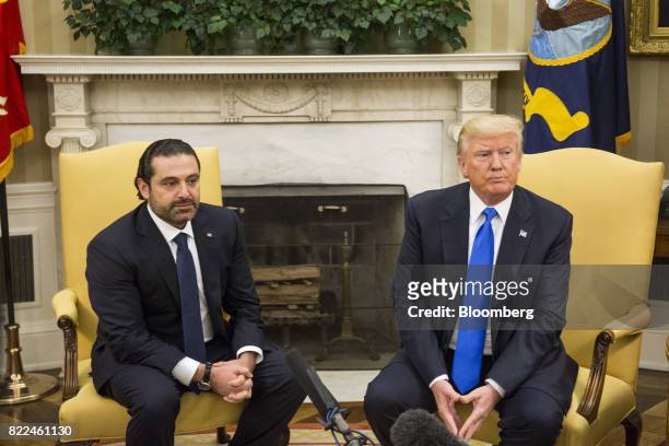 President Donald Trump, right, and Saad Hariri, Lebanon's prime minister, sit during a meeting in the Oval Office of the White House in Washington,...