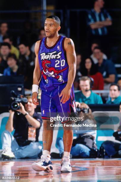 Damon Stoudamire of the Toronto Raptors stands on the court during the 1996 Rookie Challenge Practice on February 9, 1996 at the Alamodome in San...