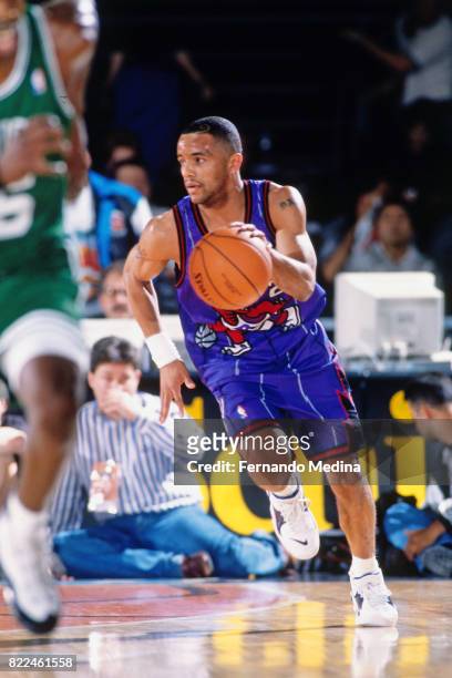 Damon Stoudamire of the Toronto Raptors dribbles during the 1996 Rookie Challenge Practice on February 9, 1996 at the Alamodome in San Antonio,...