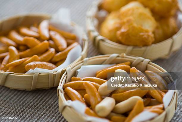 rice craker kaki no tane - kazuko kimizuka stock pictures, royalty-free photos & images