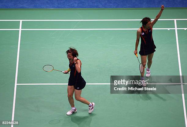 Miyuki Maeda and Satoko Suetsuna of Japan celebrate after a point during their Women's Doubles match against Wei Yang and Jiewen Zhang of China at...