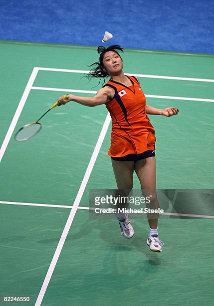 Eriko Hirose of Japan plays a shot during her Women's Singles match against Hongyan Pi of France at the Beijing University of Technology Gymnasium on...