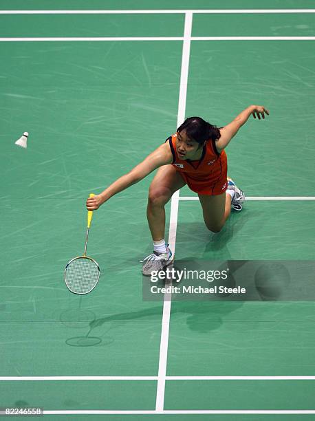 Eriko Hirose of Japan plays a shot during her Women's Singles match against Hongyan Pi of France at the Beijing University of Technology Gymnasium on...