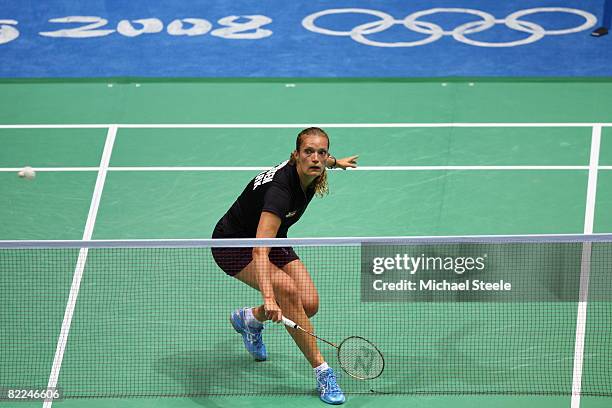 Tine Rasmussen of Denmark returns during her Women's Singles match against Maria Kristin Yulianti of Indonesia at the Beijing University of...