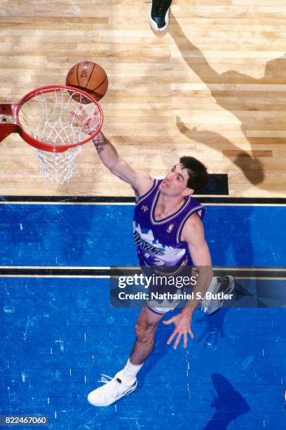 John Stockton of the Utah Jazz dribbles during the 1997 All-Star Game on February 9, 1997 at Gund Arena in Cleveland, Ohio. NOTE TO USER: User...