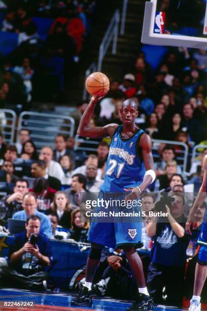 Kevin Garnett of the Minnesota Timberwolves looks to pass during the 1997 All-Star Game on February 9, 1997 at Gund Arena in Cleveland, Ohio. NOTE TO...