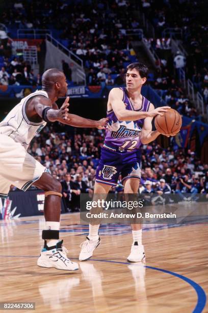 John Stockton of the Utah Jazz looks to pass during the 1997 All-Star Game on February 9, 1997 at Gund Arena in Cleveland, Ohio. NOTE TO USER: User...