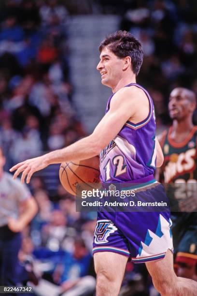 John Stockton of the Utah Jazz dribbles during the 1997 All-Star Game on February 9, 1997 at Gund Arena in Cleveland, Ohio. NOTE TO USER: User...