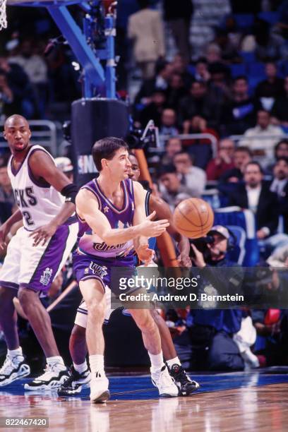 John Stockton of the Utah Jazz passes during the 1997 All-Star Game on February 9, 1997 at Gund Arena in Cleveland, Ohio. NOTE TO USER: User...