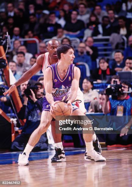 John Stockton of the Utah Jazz posts up during the 1997 All-Star Game on February 9, 1997 at Gund Arena in Cleveland, Ohio. NOTE TO USER: User...