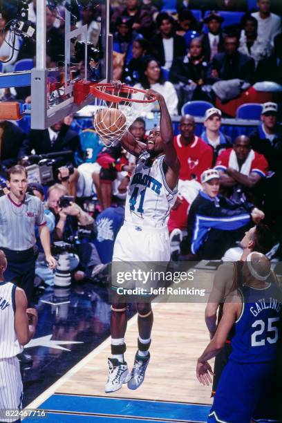 Glen Rice of the Charlotte Hornets dunks during the 1997 All-Star Game on February 9, 1997 at Gund Arena in Cleveland, Ohio. NOTE TO USER: User...