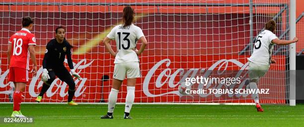 Germany's defender Babett Peter scores during the UEFA Women's Euro 2017 football match between Russia and Germany at Galgenwaard Stadium in Utrecht...