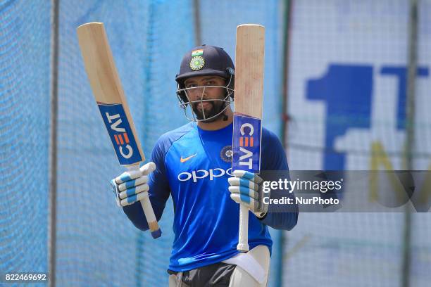 Indian cricketer Rohit Sharma takes part in a practice session ahead of the 1st test match between Sri Lanka and India at Galle International cricket...