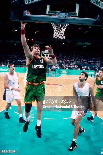 Arvydas Sabonis of Lithuania shoots during the 1996 Olympics circa 1996 in Atlanta, Georgia. NOTE TO USER: User expressly acknowledges and agrees...