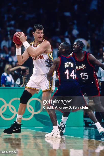 Arvydas Sabonis of Lithuania looks to pass during the 1996 Olympics circa 1996 in Atlanta, Georgia. NOTE TO USER: User expressly acknowledges and...