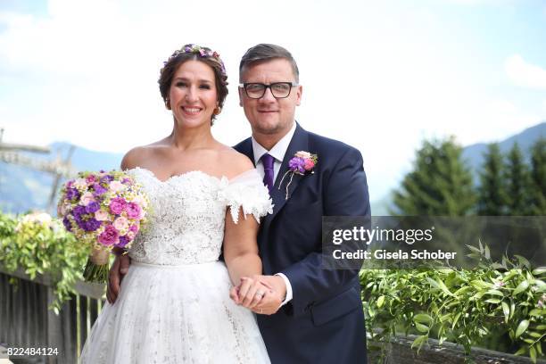 Bride Annika Koch wearing a dress by Irene Luft and her husband bridegroom Torsten Koch during the wedding of Torsten Koch and Annika Hofmann at...