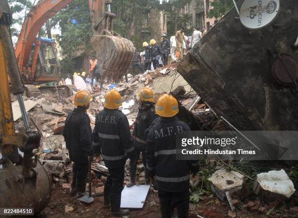 And Mumbai Fire Brigade trying to search and rescue people who caught in a building named Sai Darshan Apartment which collapsed at Ghatkopar East on...