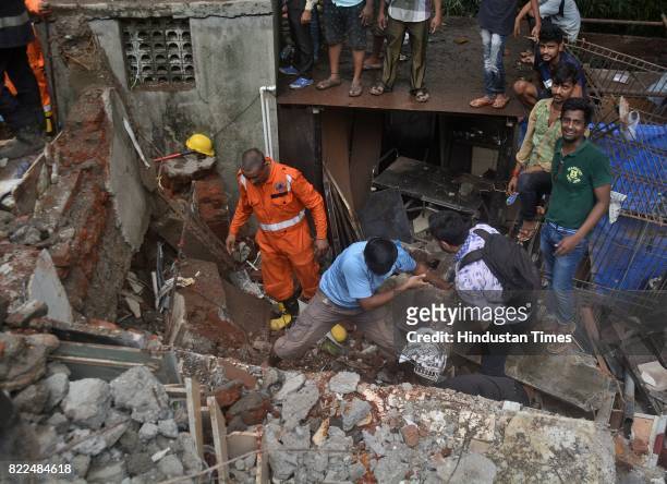 And Mumbai Fire Brigade trying to search and rescue people who caught in a building named Sai Darshan Apartment which collapsed at Ghatkopar East on...