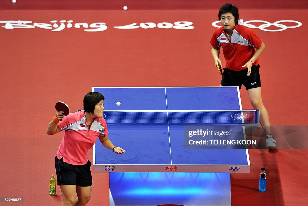 Singapore's table tennis players Wang Yu