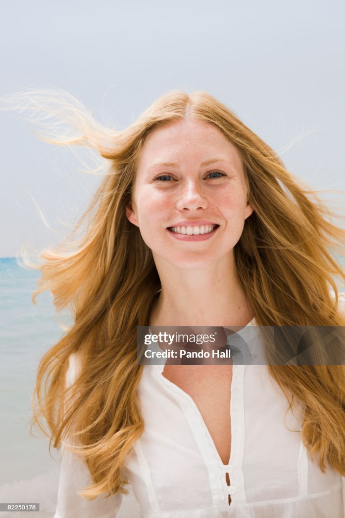 Young woman smiling, portrait