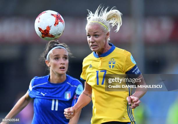 Sweden's Caroline Seger vies with Italy's Barbara Bonansea during the UEFA Women's Euro 2017 football match between Sweden and Italy at De Vijverberg...