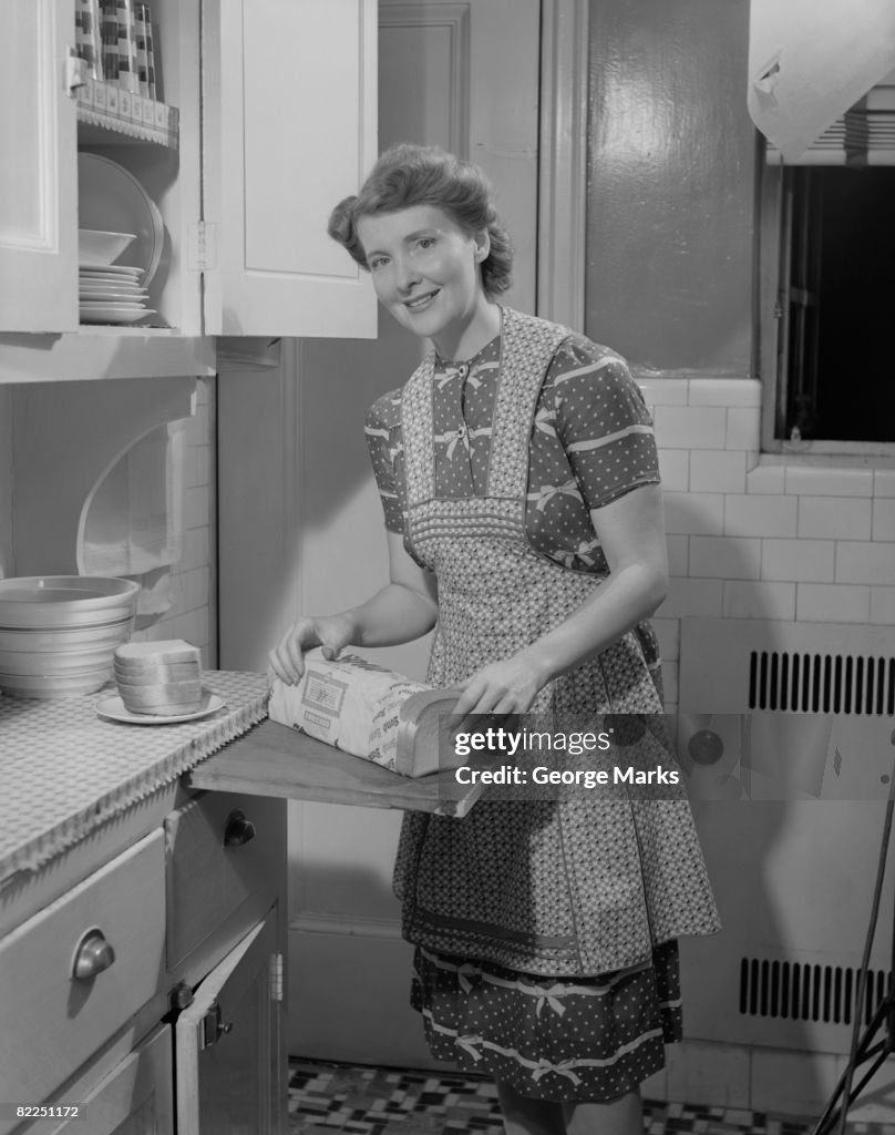 Portrait of woman preparing breakfast in kitchen