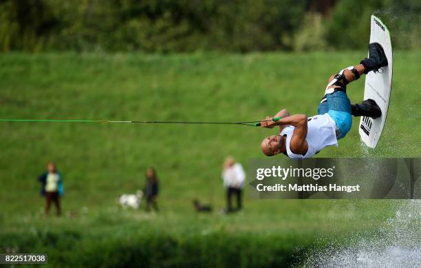 Roberts Linavskis of Latvia competes during the Wakeboard Freestyle Men's Quarterfinal of The World Games at Old Odra River on July 25, 2017 in...