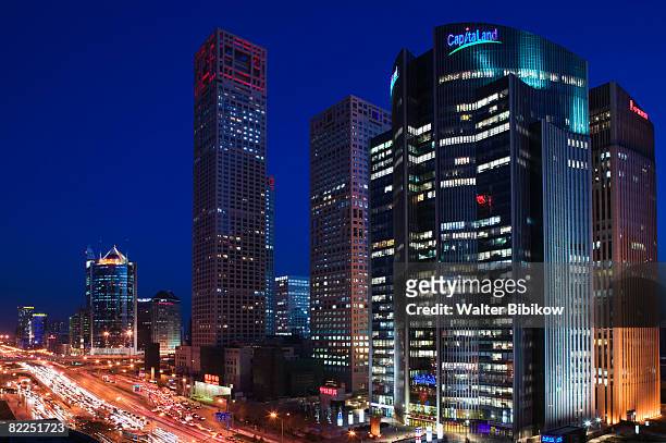 view of jianguomenwai dajie and office buildings - jianguomenwai stock pictures, royalty-free photos & images