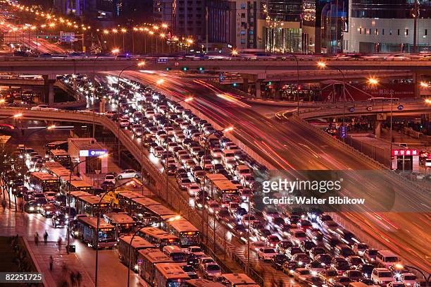 traffic on jianguomenwai dajie looking east - jianguomenwai stock pictures, royalty-free photos & images