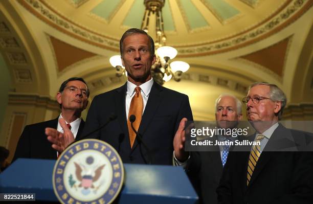 Sen. John Thune speaks to reporters during a news conference on Capitol Hill following a procedural vote on the GOP health care bill on July 25, 2017...