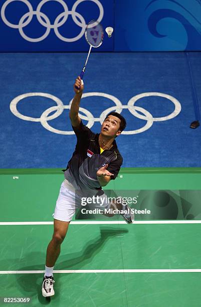 Taufik Hidayat of Indonesia competes in the men's badminton singles event at the Beijing University of Technology Gymnasium on Day 3 of the Beijing...