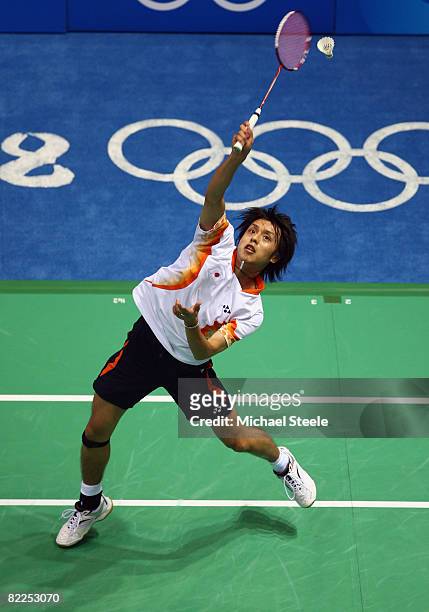 Shoji Sato of Japan competes in the men's badminton singles event at the Beijing University of Technology Gymnasium on Day 3 of the Beijing 2008...