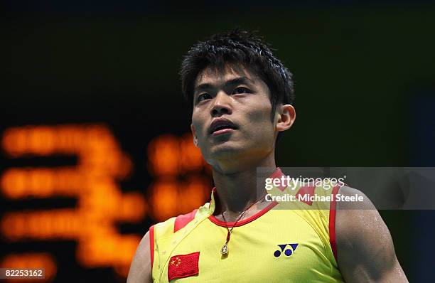 Lin Dan of China competes in the men's badminton singles event at the Beijing University of Technology Gymnasium on Day 3 of the Beijing 2008 Olympic...