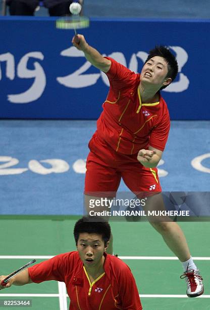 Du Jing and Yu Yang of China play against Ogura Kumiko and Shiota Reiko during the women's doubles quarter final badminton match of the 2008 Beijing...