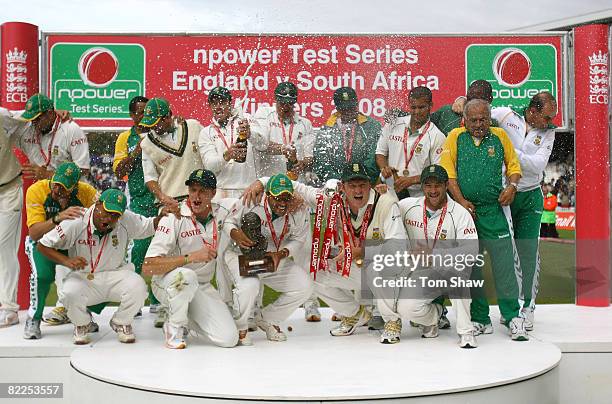 The South African team celebrate with the trophy during day 5 of the 4th Npower Test Match between England and South Africa at the Oval on August 11,...