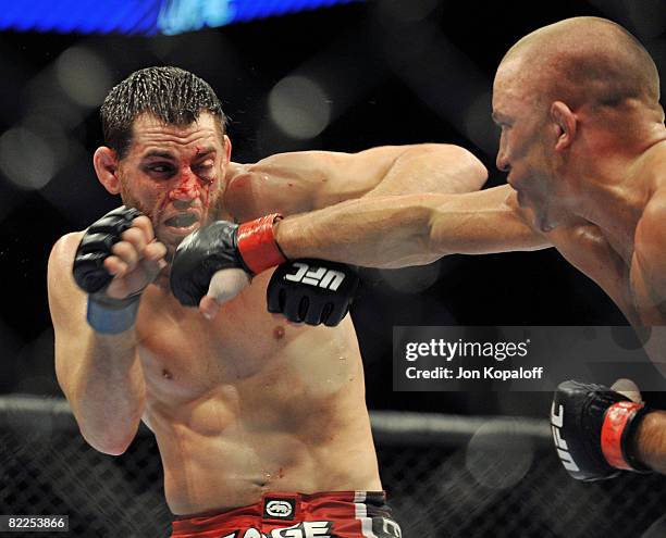 Fighters Jon Fitch fighting Georges St-Pierre during the UFC 87: Seek and Destroy at the Target Center on August 9, 2008 in Minneapolis, Minnesota.