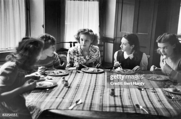 Members of the Tiller Girls dance troupe lodge at the Theatre Girls' Club on Greek Street, in London's Soho, 17th December 1949. Original Publication...